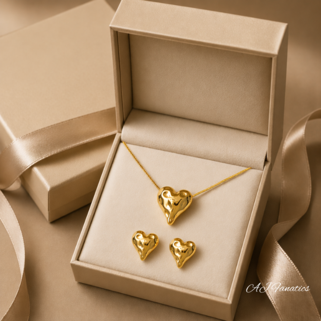 Melting Hearts Lustrous Heartbeats Gift Sets – a fluid gold heart necklace with matching studs, beautifully presented in a luxe box, ready to say “you melt my heart.”